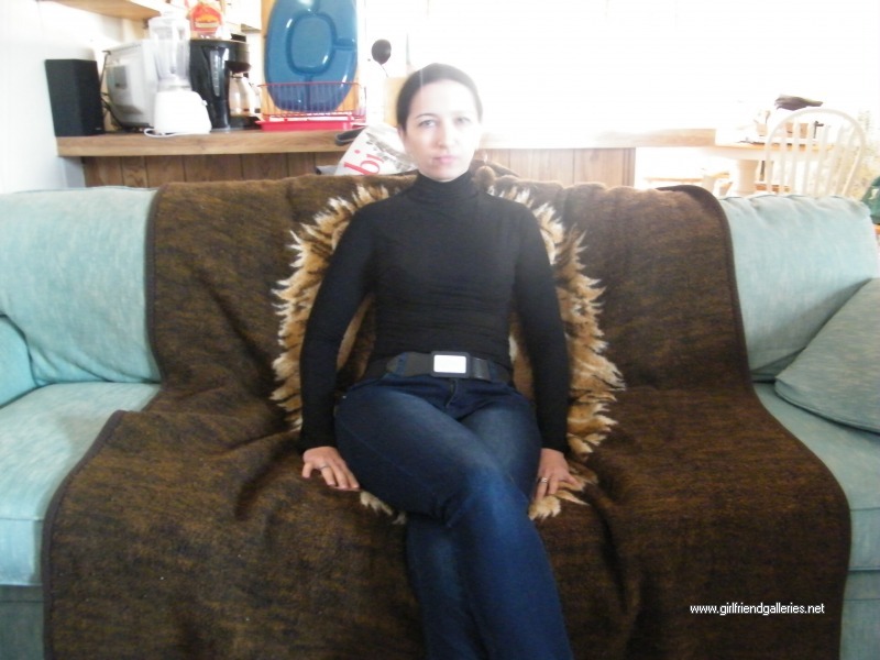 Curvy wife takes her jeans off on the couch 
