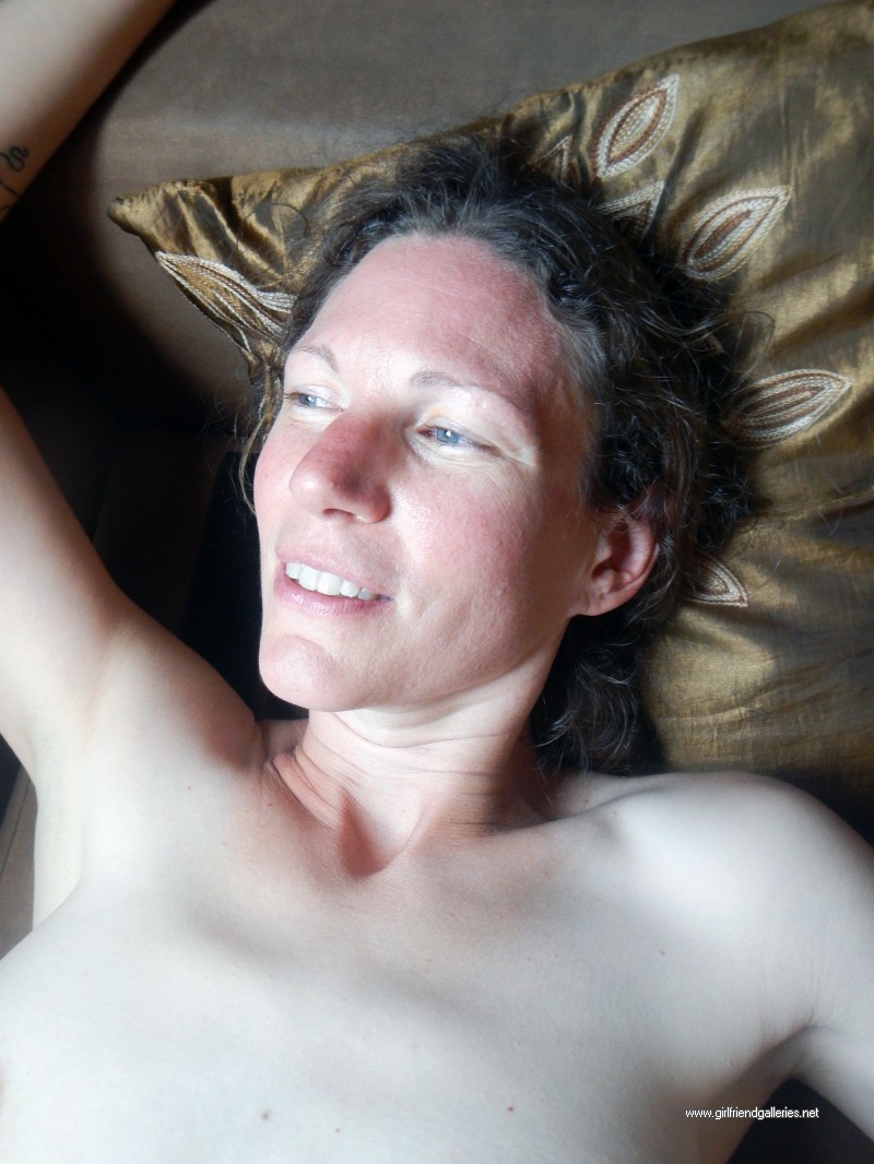 43 year old Shelly on the brown couch