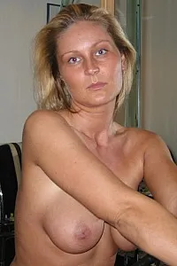 Denise on chair before miror