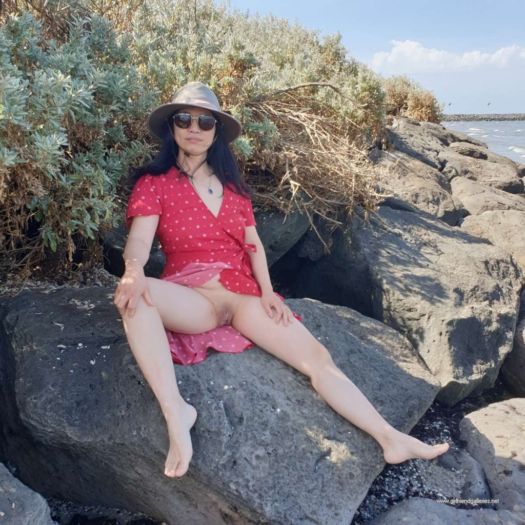 Chinese wife flashing at the beach